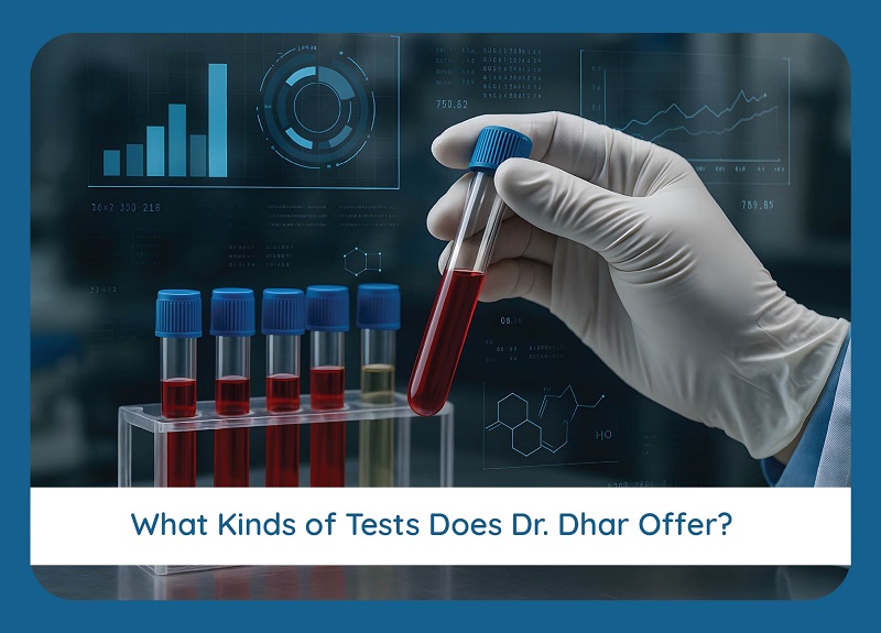 Hand holding a blood sample vial with data in the background